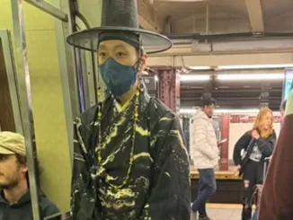 Korean man in NYC Subway car