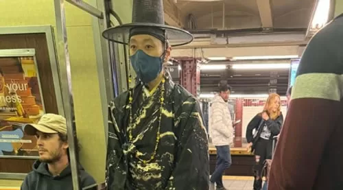 Korean man in NYC Subway car